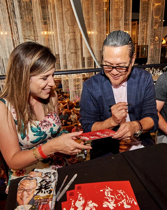 Chef Morimoto and a guest